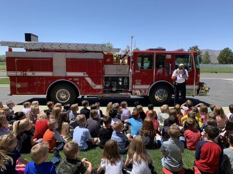 1st grade being visited by Payson fire truck 