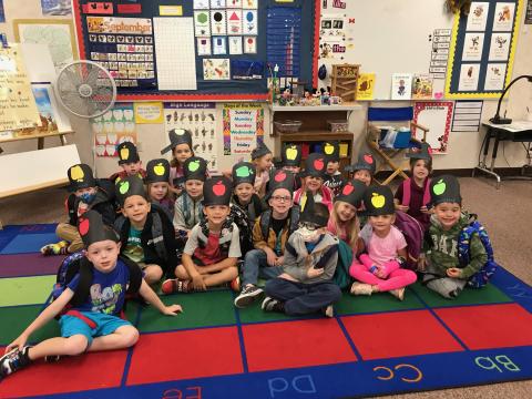 Kindergarten class with Johnny Appleseed hats.