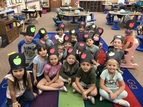 Kindergarten class with Johnny Appleseed hats.