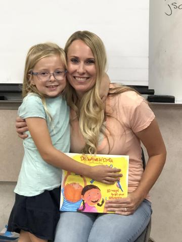 Mystery Reader with her daughter