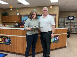 Stephanie Quarnberg being recognized as classified employee of the year at Spring Lake