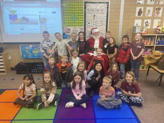 Santa with first grade students 